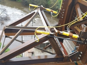 Safely Erecting a Bridge Over Water with a Hydraulic Driven Launching Nose